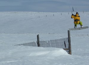 snow fence jumpig.JPG